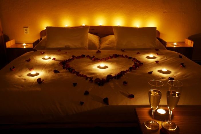 bed with candles